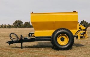 A yellow trailer at the backyard